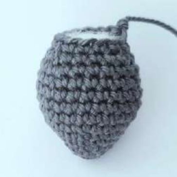 Stuffed crochet bat body, round at the top and narrowing to a point