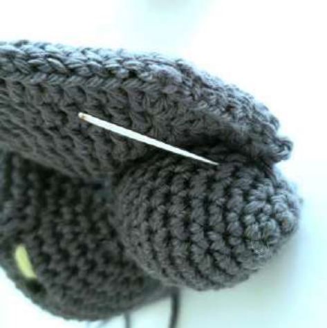 Needle attaching the lower part of a crochet wing to the bat body