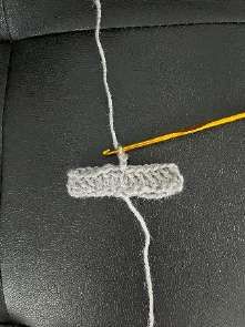 Gray crochet ring of double crochet with a ch 2 at the start of round 2