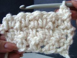 Three rows of cream crochet seed stitch