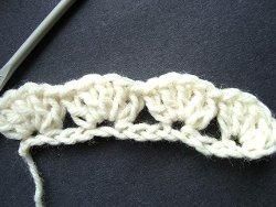 Cream crochet row of shells on a chain
