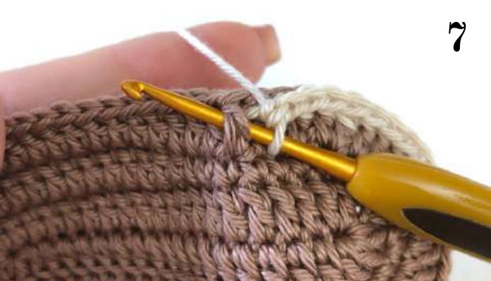 Beige single crochet worked around the edge of the brown sole