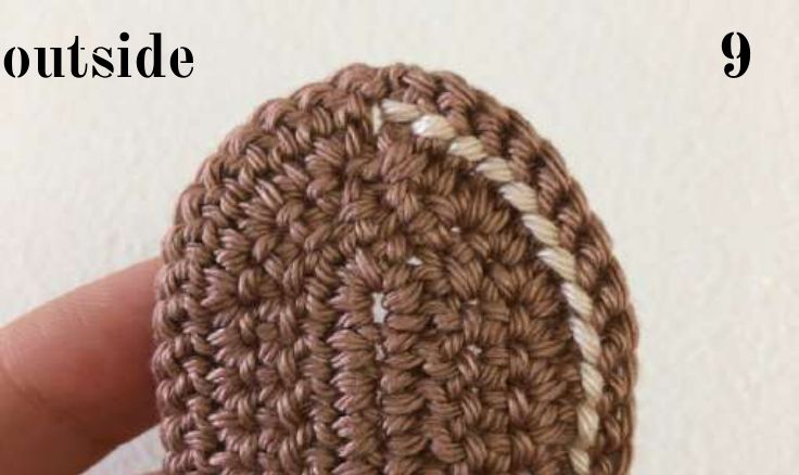 Outside of the brown sole with the beige ridge of round 1