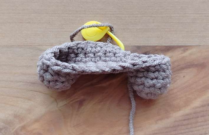 Two small crochet bear legs joined by a short chain into one round
