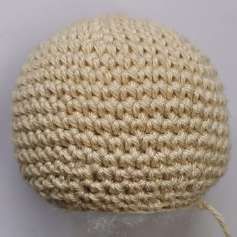 Round light beige crochet doll head, stuffed