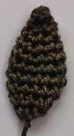 Small flat green crochet leaf